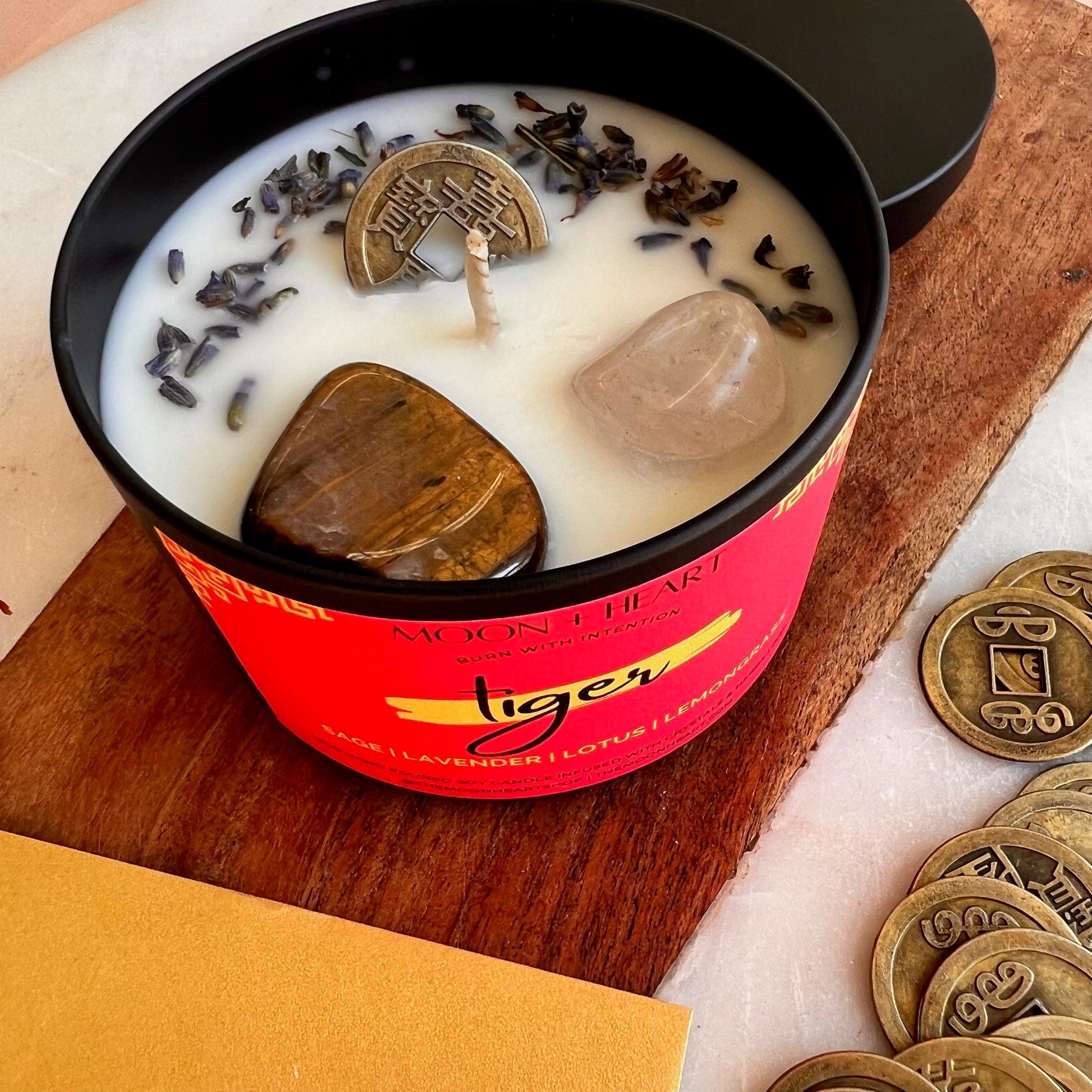 chinese zodiac candle tiger sign infused with feng shui coin and crystals, scented sage lavender lotus and lemongras