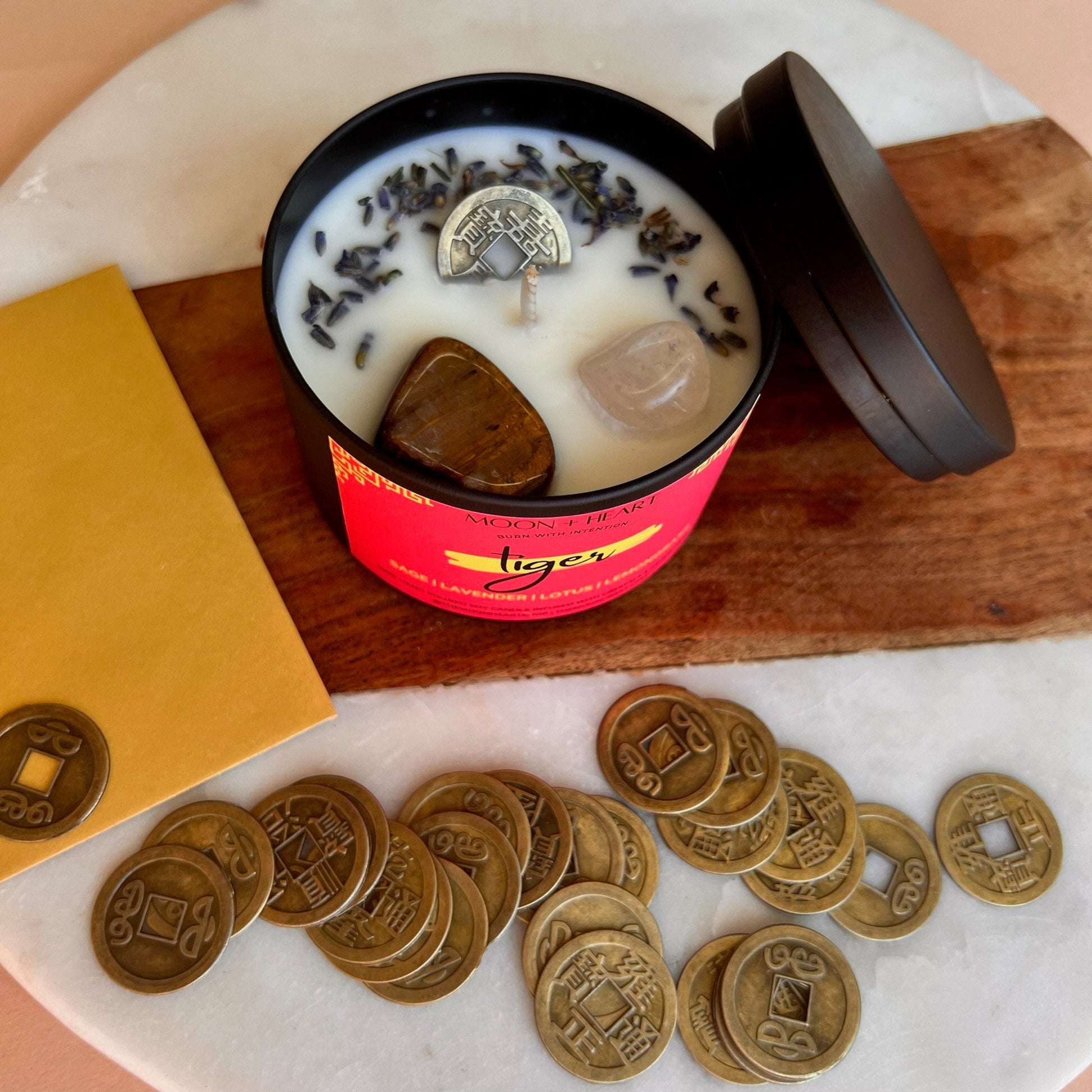 chinese zodiac candle tiger sign infused with feng shui coin and crystals, scented sage lavender lotus and lemongras